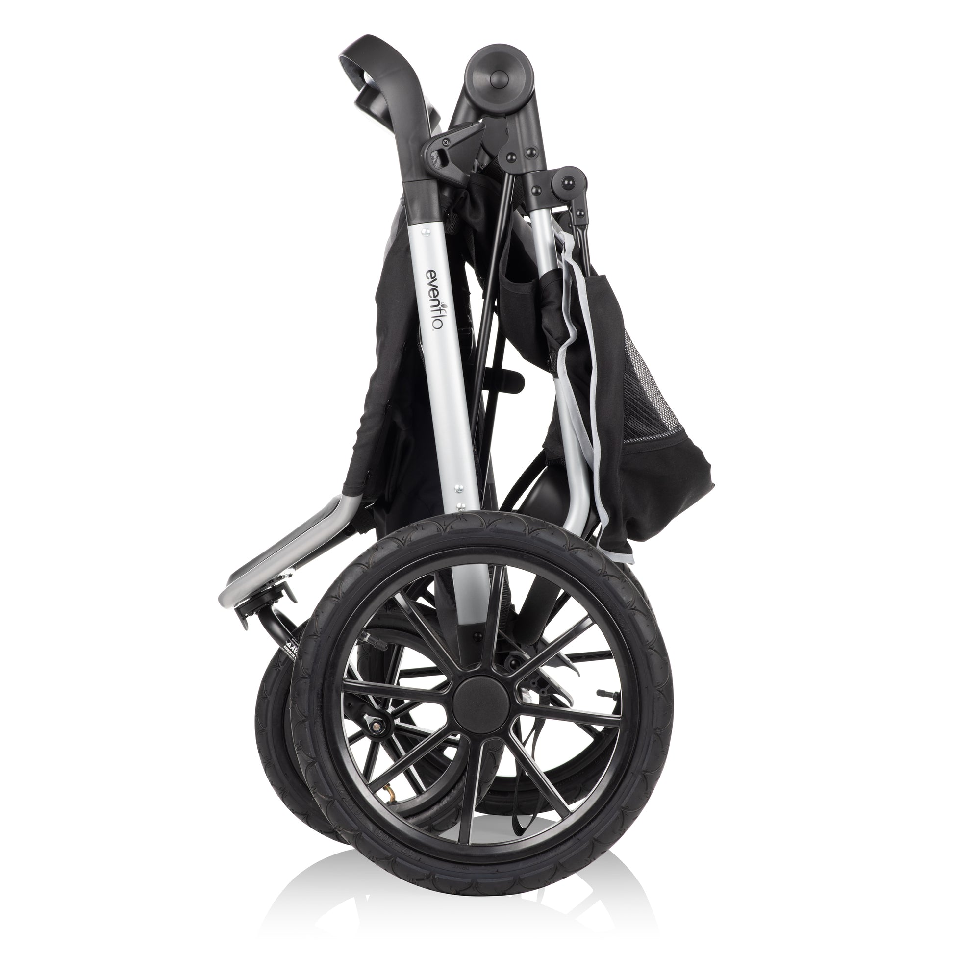 A  black and silver Evenflo jogging stroller is shown in a folded, compact position