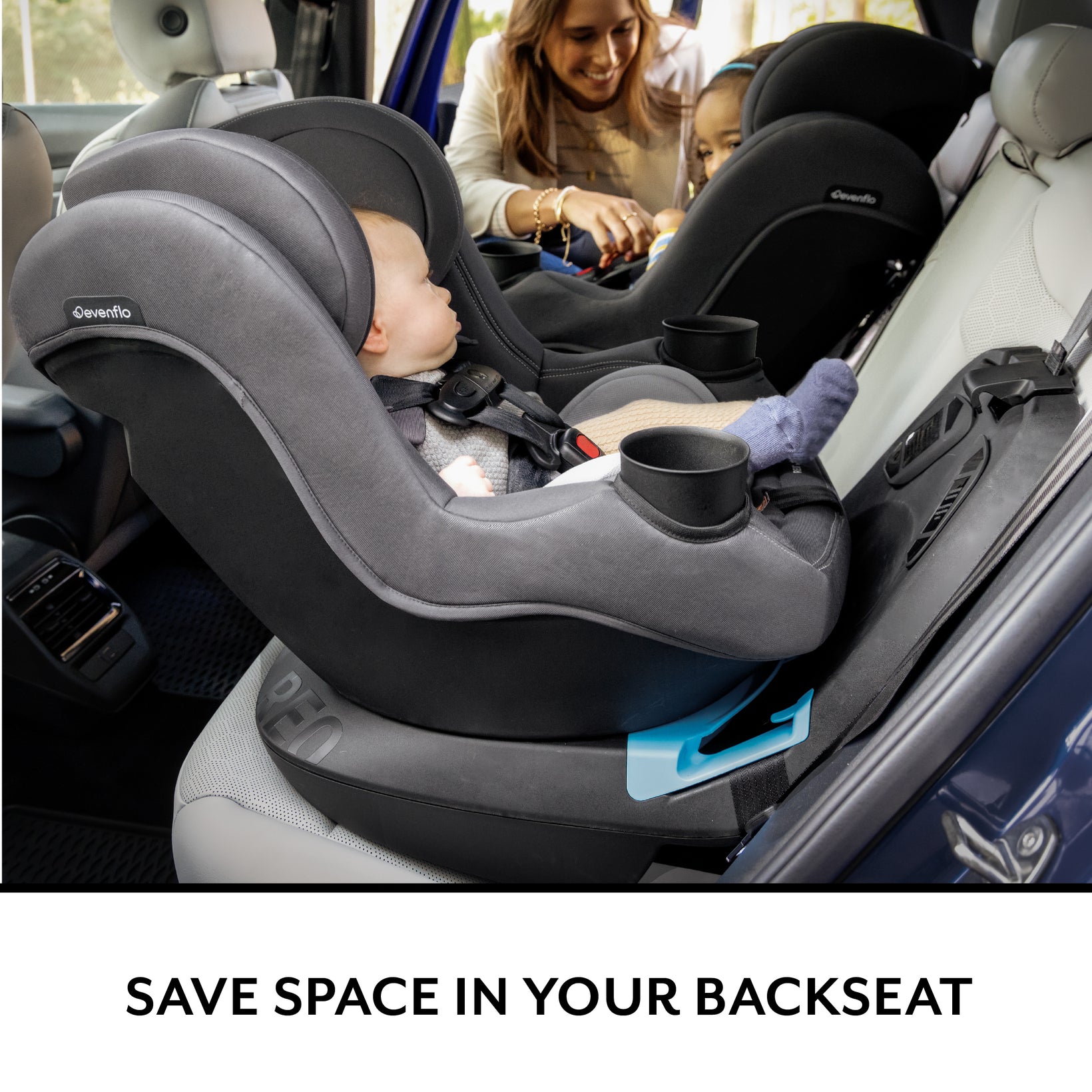Two Evenflo car seats in a vehicle, one rear-facing with a baby, and one forward-facing with an older child.