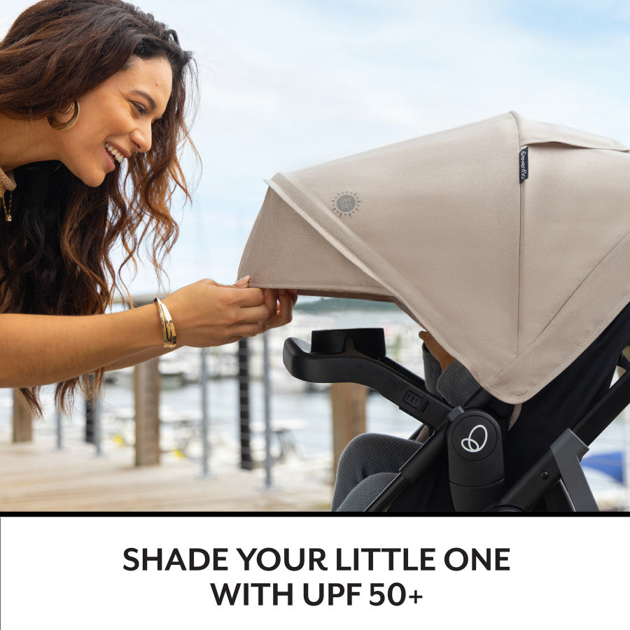 Shield your baby from the sun with this stroller's adjustable UPF 50+ canopy.