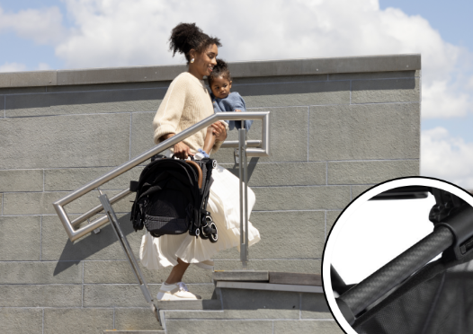 With the lightweight stroller folded, you carry your child and a backpack up the stairs with ease.