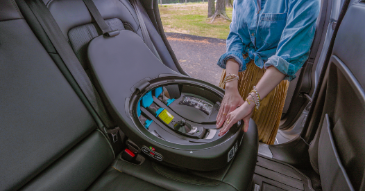 Witness the incredible convenience as you effortlessly secure the rotating car seat base in your vehicle.