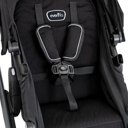 Black stroller seat with harness system and Eventa logo on a white background