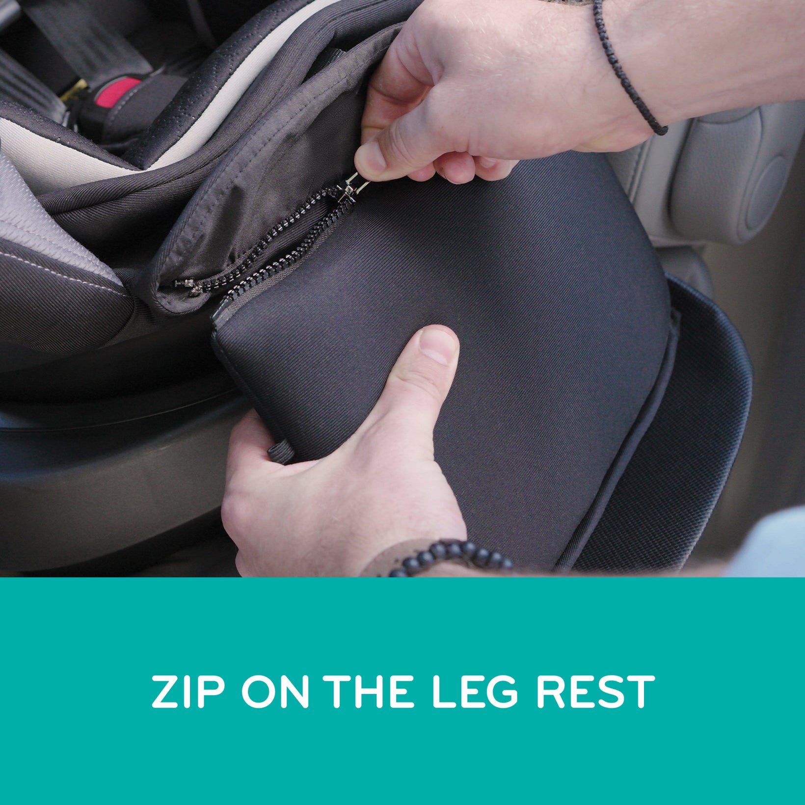 Person zipping a car seat cover over a leg rest 