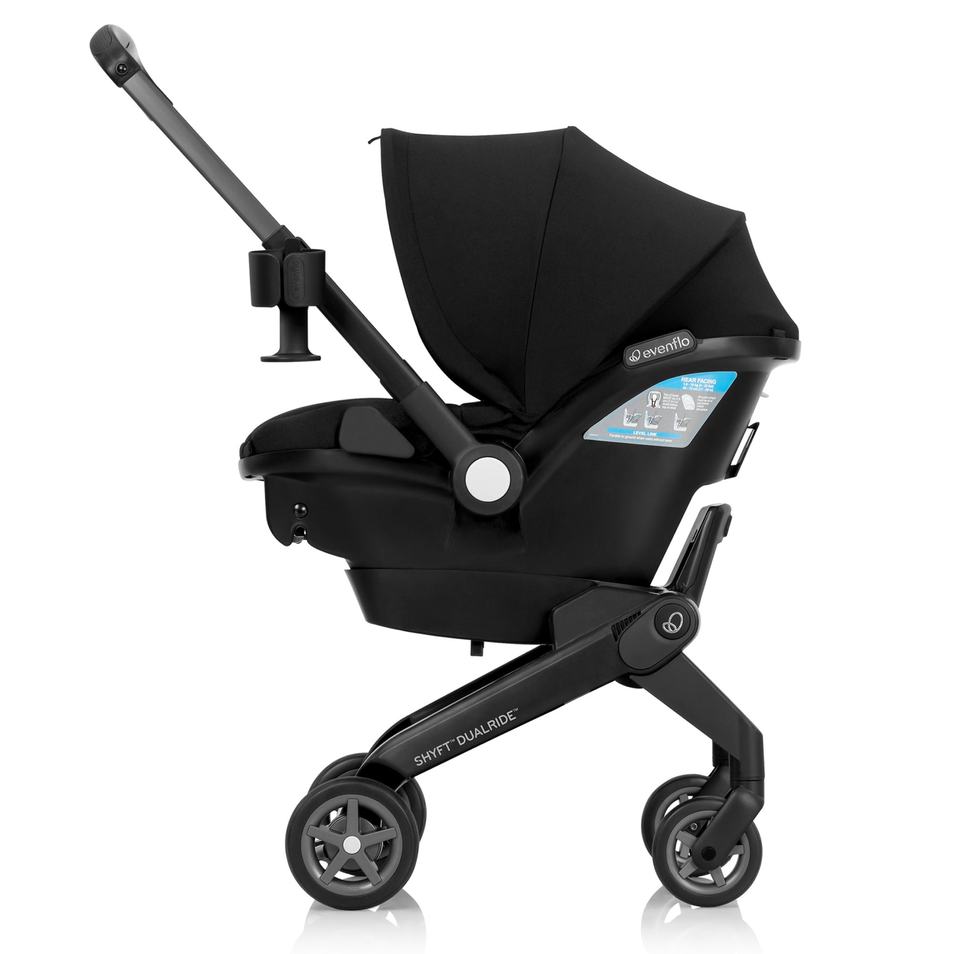 Side view of a black Evenflo Shyft DualRide, an infant car seat converted into a stroller.