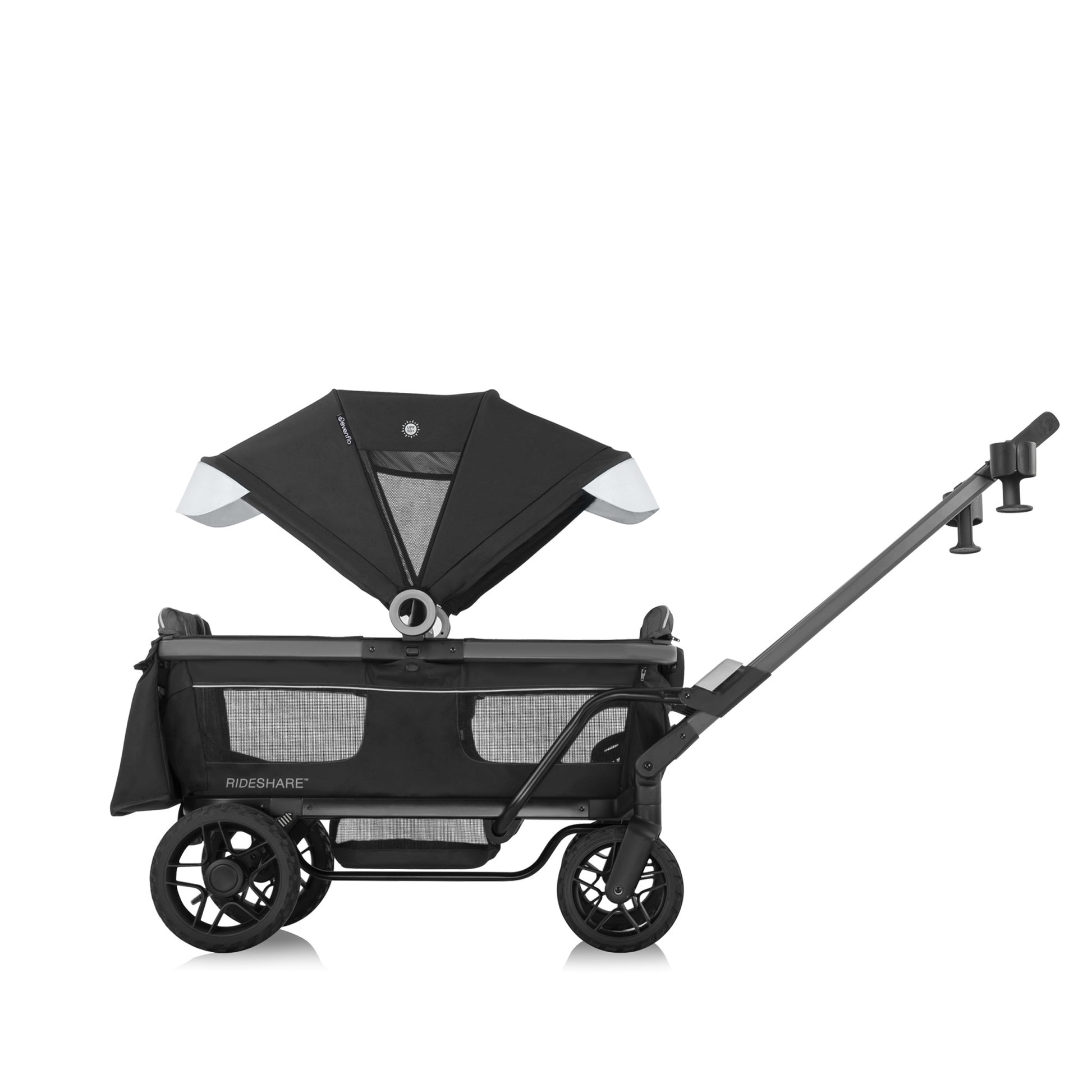 Side view of a black Evenflo RIDESHARE stroller wagon with an extended handle and canopy.