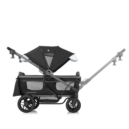 Evenflo RIDESHARE stroller wagon with a layered visual effect, showing its reversible push handle.